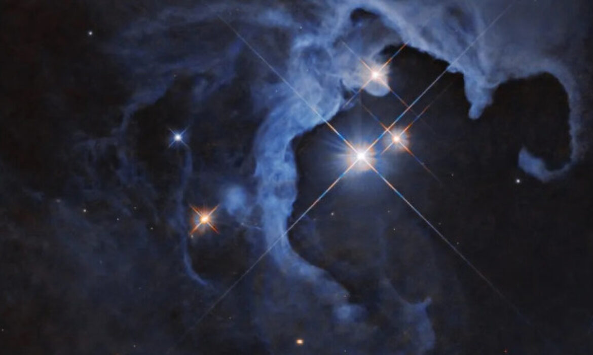 Fotografia do Hubble revela sistema com três jovens estrelas